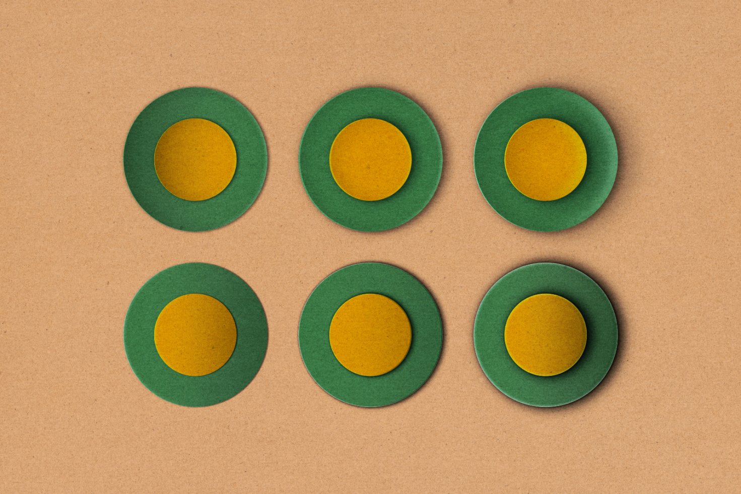 Abstract graphic elements with green and yellow circular shapes on a brown textured background. Perfect for use in mockups, templates, and design projects.