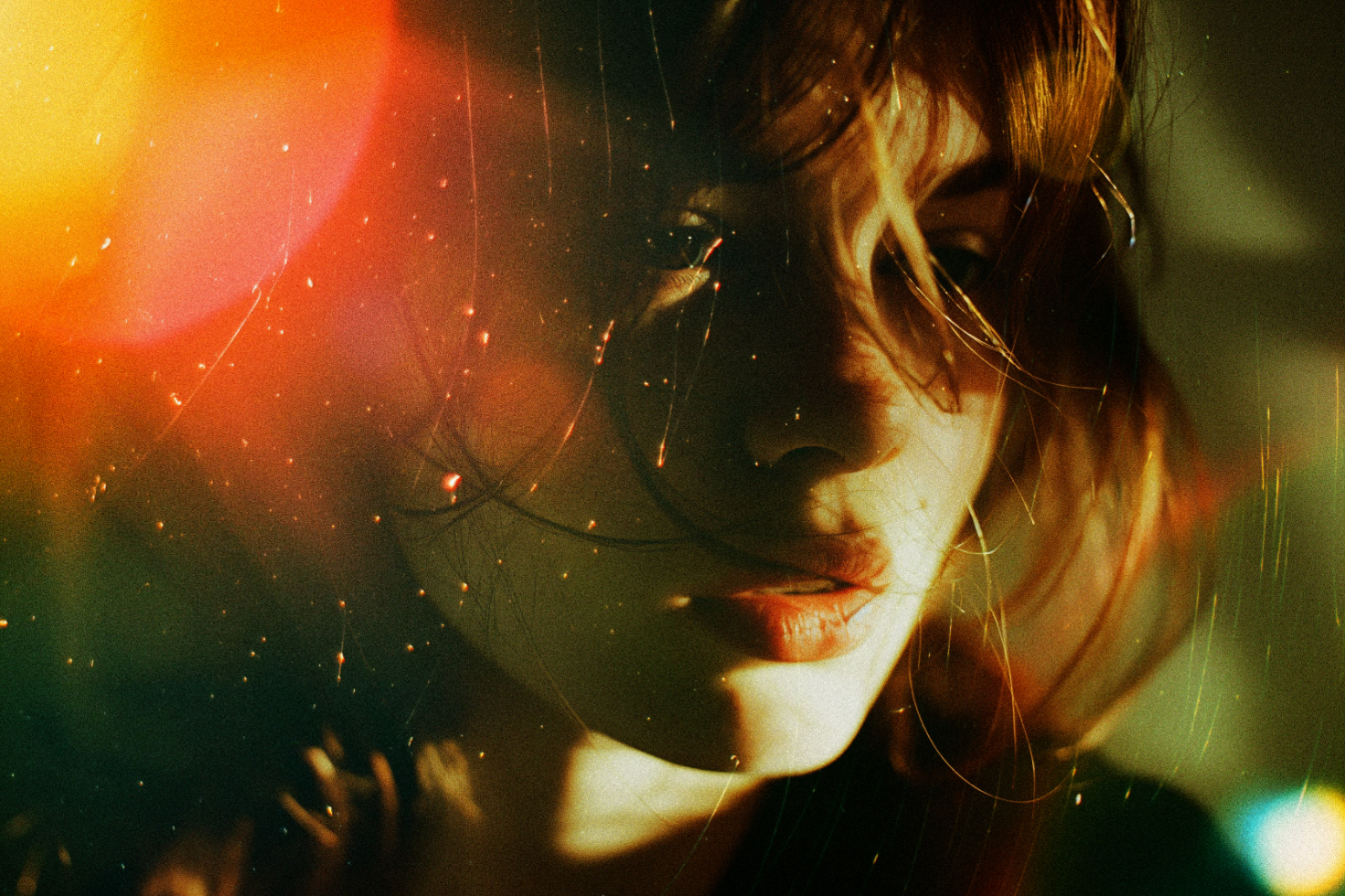 Moody portrait of a woman with colorful light leaks overlay, perfect for graphic design projects, creative templates, and visual mockups for digital assets.