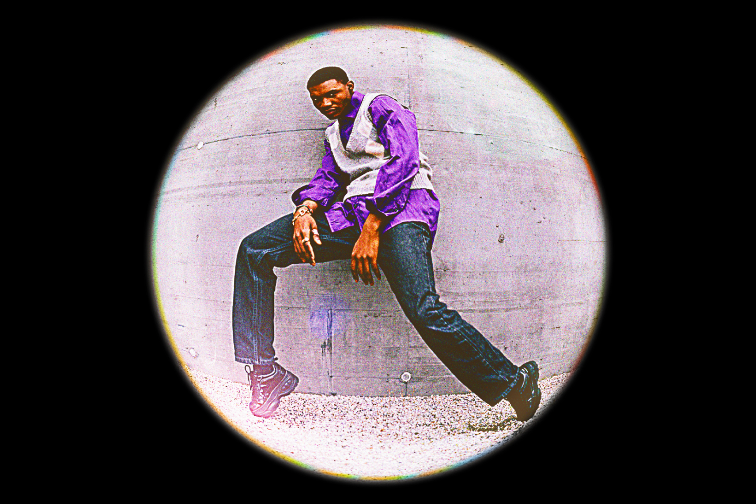 Circular stylized photo of person in casual attire posing against concrete wall. Perfect for fashion templates, mockups, digital design assets, urban, street-style.