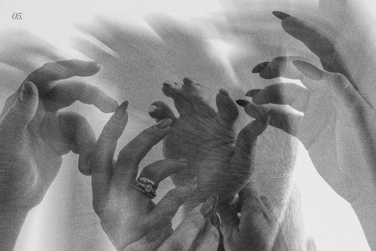 Abstract multi-exposure photo of hands in black and white creating a textured artistic effect ideal for graphic design projects and creative digital assets.