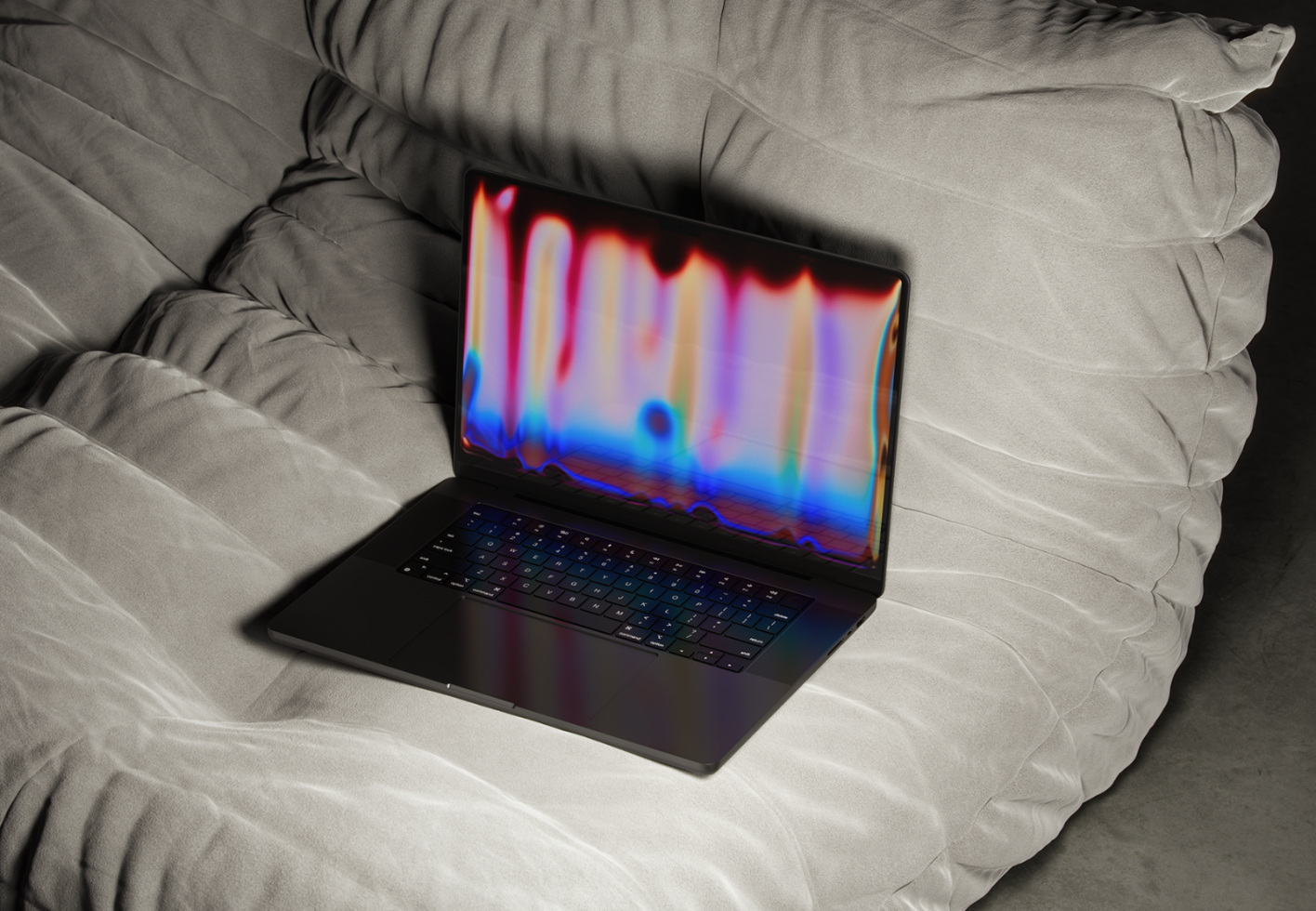 Mockup of a laptop with colorful distorted screen on a plush grey sofa ideal for showcasing digital assets for designers. Keywords: laptop mockup design template.