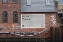 White banner on red brick waterfront building mockup