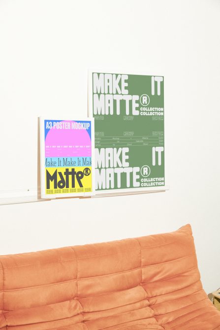 A3 poster mockup with colorful design displayed on wall above a peach sofa. Perfect for showcasing graphic design templates and marketing materials.