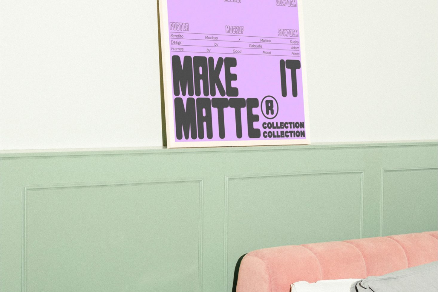 Poster mockup with matte finish featuring bold typography in a minimalistic room setting on a pastel green paneled wall and a pink sofa.