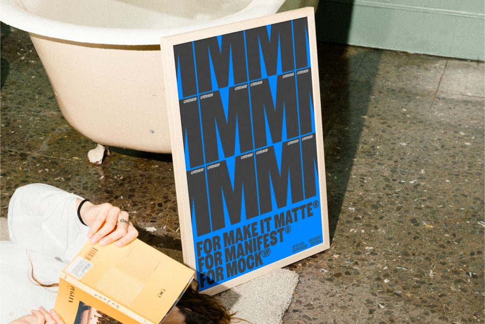 Poster Mockup leaning against bathtub with bold blue graphics, text reading For Make It Matte For Manifest For Mockup Perfect for Designer presentations