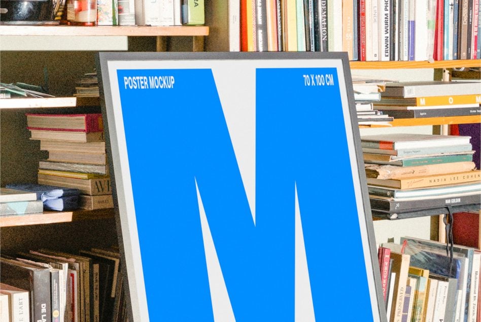 Blue 70x100cm poster mockup tilted against stacked books on library shelves