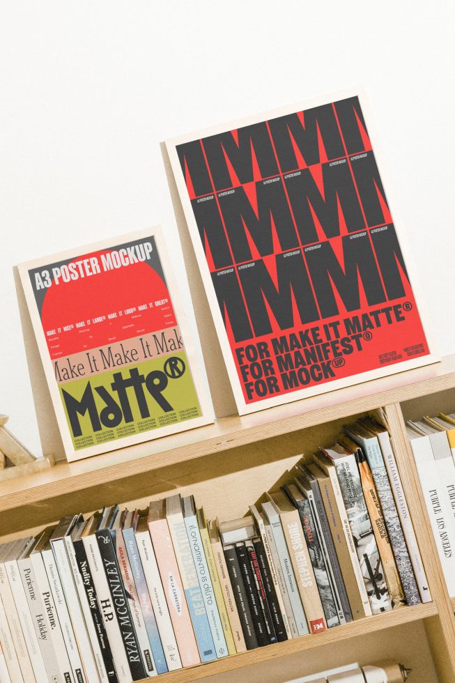 Two framed A3 poster mockups displayed on a wooden shelf with books. Ideal for showcasing minimalist and modern graphic designs.