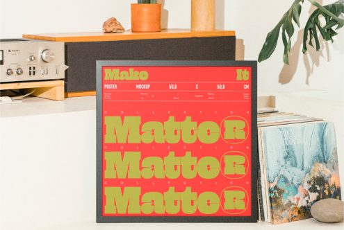 Framed poster mockup on a modern desk setup with vintage elements, ideal for showcasing graphic design projects, typography presentations, and template previews.