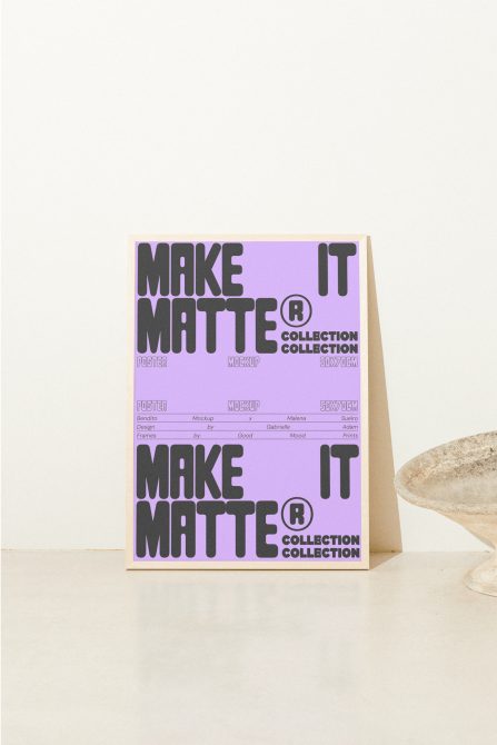 Minimalist poster mockup with bold black text on a lavender background framed in wooden stand ideal for designers digital assets templates and graphic design.