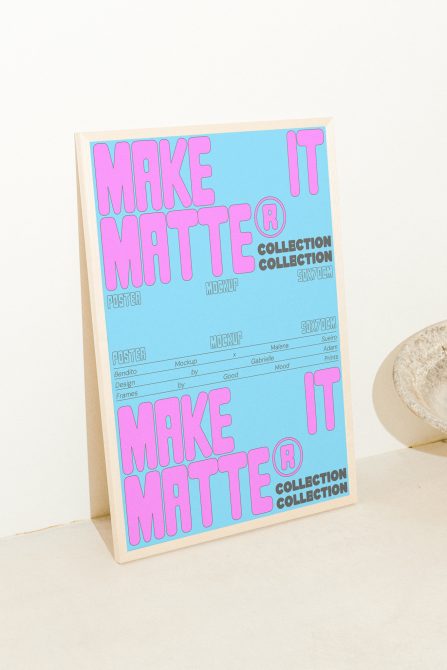 Poster mockup template on light beige background, displaying Make It Matte text in bold pink. Perfect for graphic designers, showcasing mockup templates.