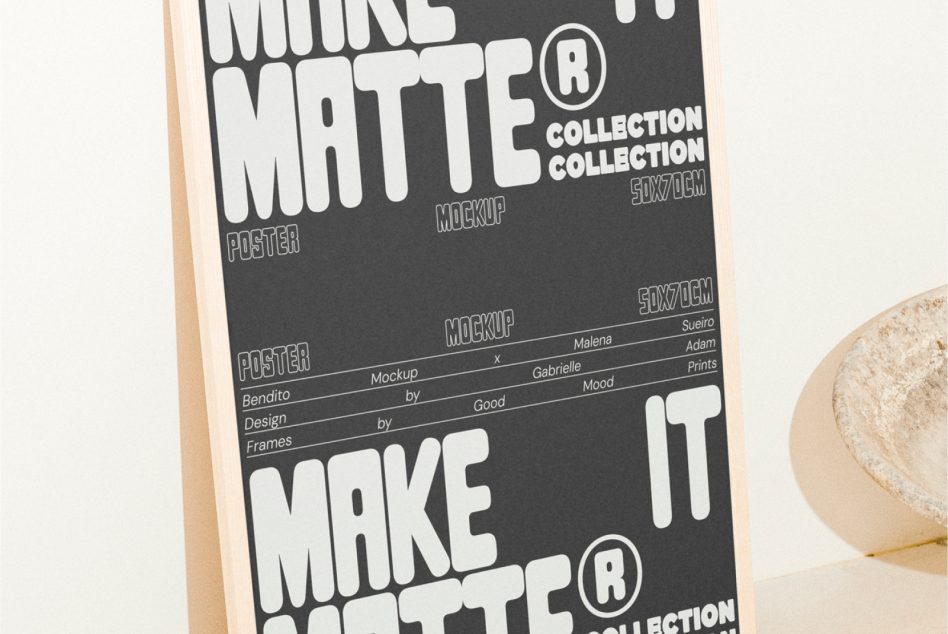 Poster mockup standing on a wooden frame with bold typography reading Make It Matte. Ideal for digital asset marketplaces targeting designers. Mockup, Posters, Templates