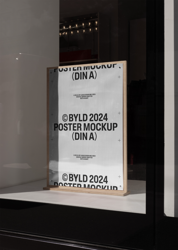 Poster mockup DIN A in wooden frame displayed in a window. Perfect for showcasing designs, templates, graphics. Ideal for designers and digital assets.