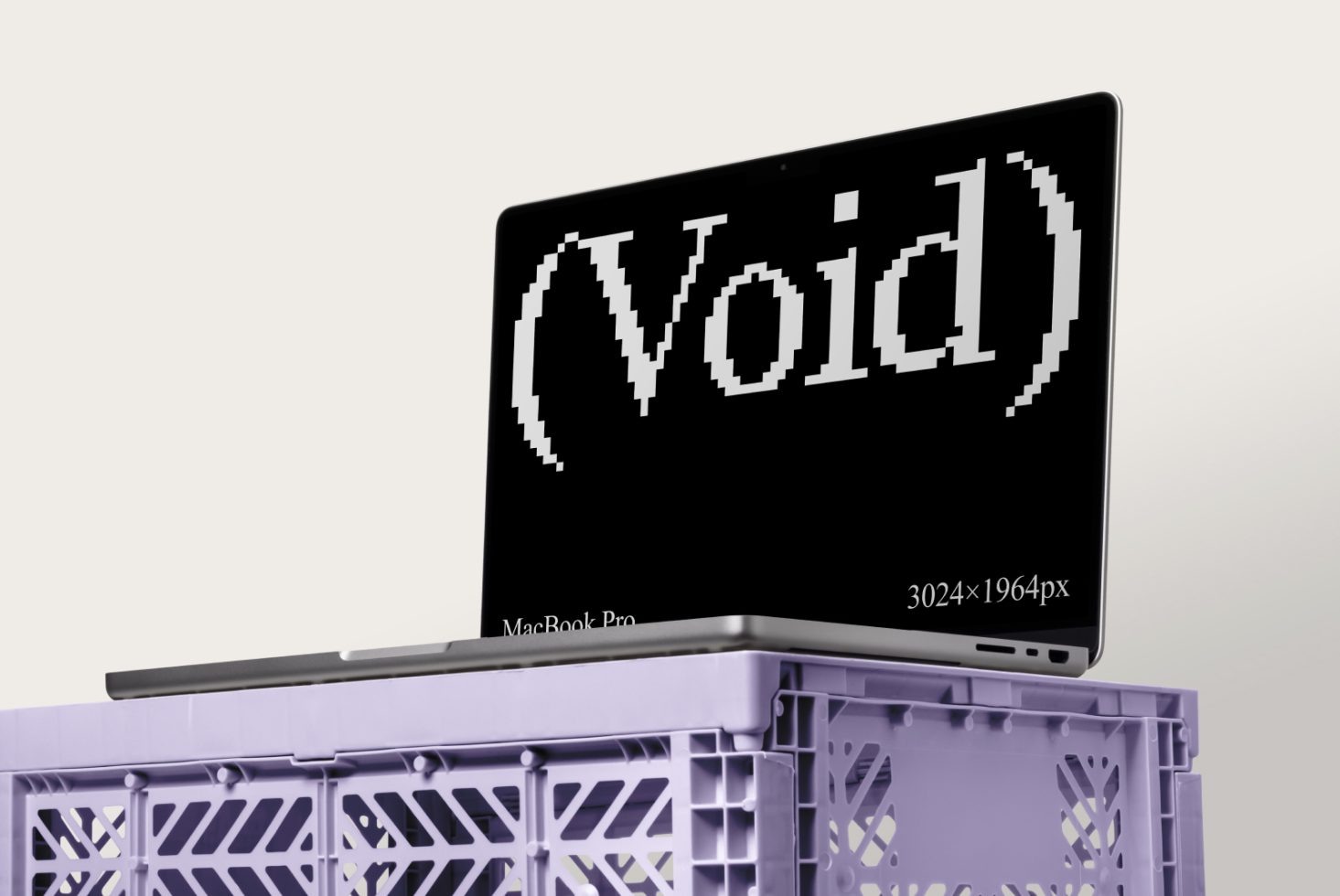 MacBook Pro mockup showcasing void text on screen in pixelated font, placed on a purple storage crate. Ideal for presenting website designs or graphic work.