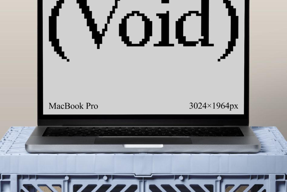 MacBook Pro laptop template on a plastic crate with pixel art text Void on screen SEO keywords: mockups, MacBook Pro, pixel art, 3024x1964px.