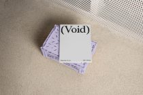 White magazine cover mockup with pixelated Void text on lavender crate base