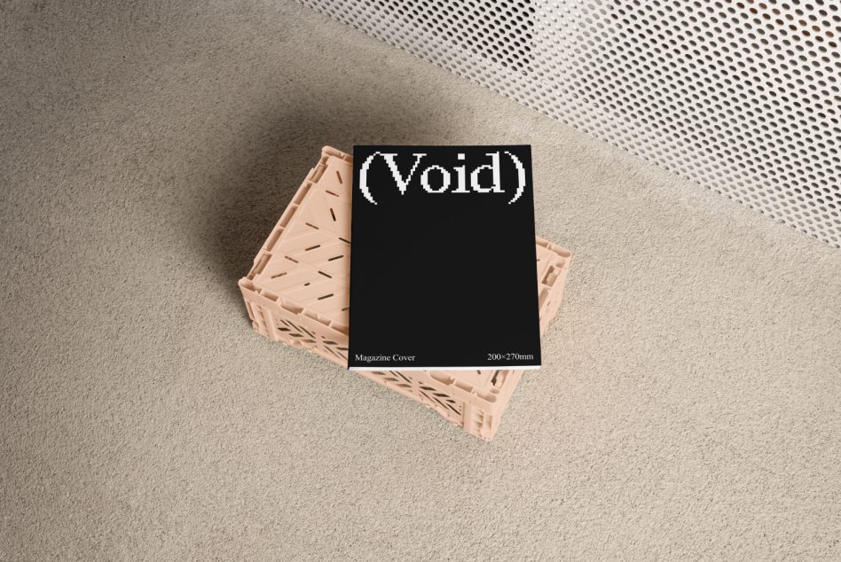 Black magazine cover mockup with pixelated Void text on peach crate surface