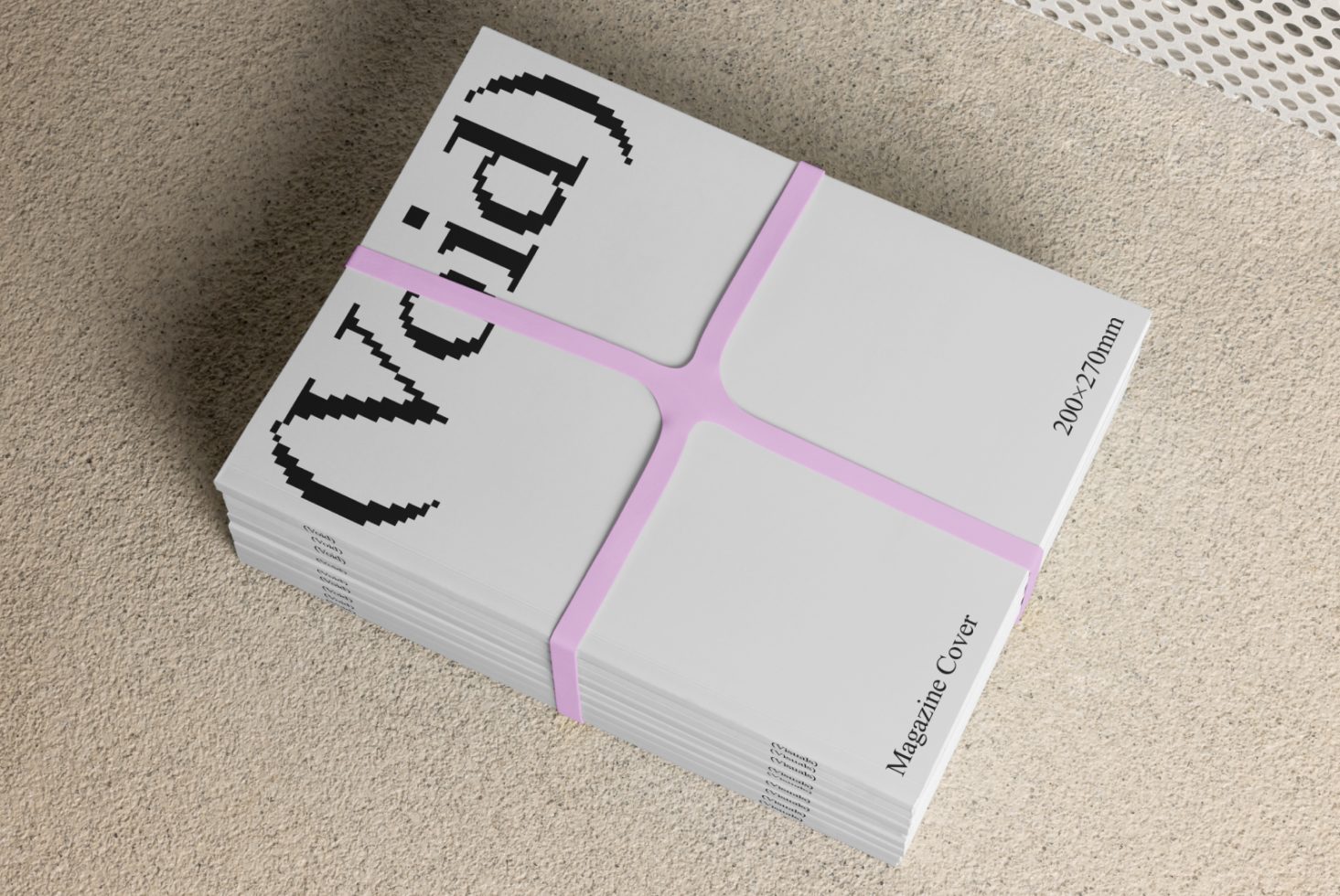 Stack of magazines with minimalist design and pixelated VOID text on covers tied with pink band. Ideal for modern graphic design templates. 200x270mm.