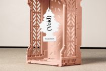 Terracotta plastic crate with white hanging air freshener tag showing Void branding