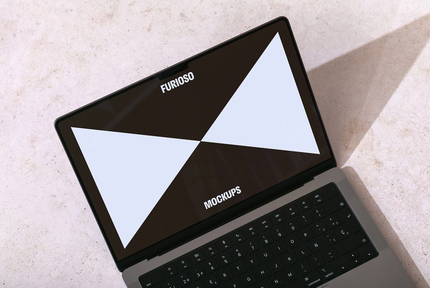 Laptop screen displaying Furioso mockups, top view on light stone background. Suitable for showcasing design templates. Keywords: mockups, templates, design.