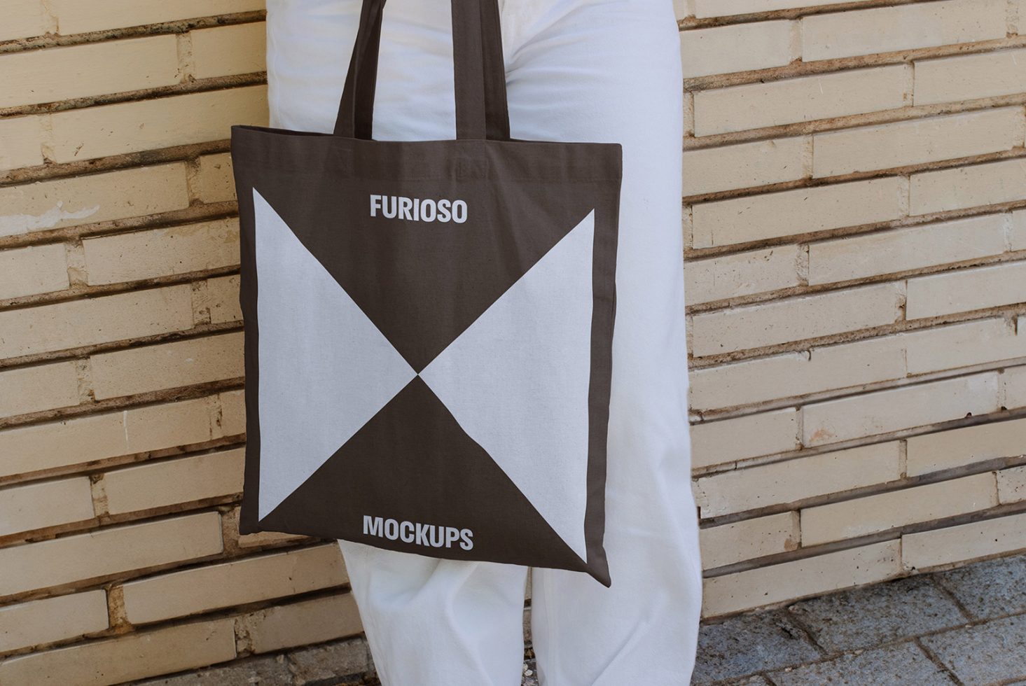 Tote bag mockup template for designers featuring a neutral color scheme with the text Furioso Mockups. Ideal for showcasing designs or branding materials.