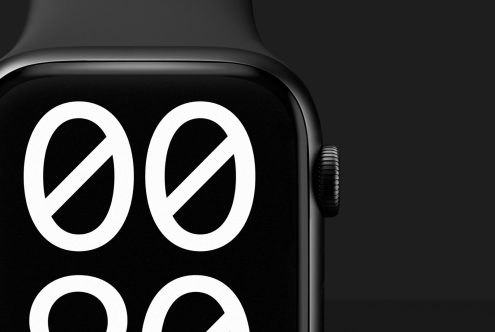 Close-up of a smartwatch showing a minimalist watch face with large white numerals. Ideal for designers seeking device mockups digital assets and templates.