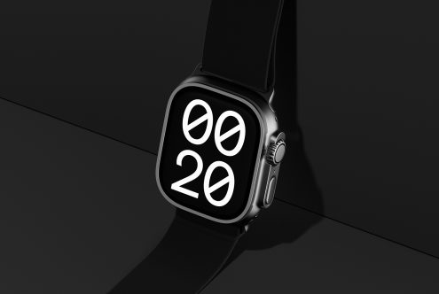 Smartwatch mockup with black band and digital display showing time against dark background perfect for product presentations and graphic design projects