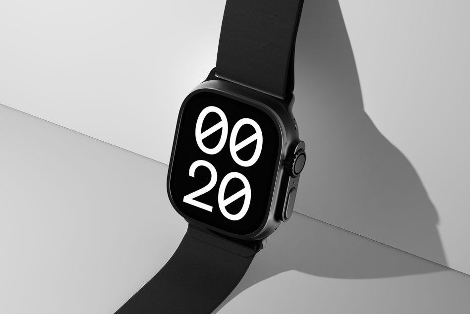 Digital smartwatch mockup displaying bold white numbers on a black screen minimalist modern design sleek black wristband for design projects UX/UI display.