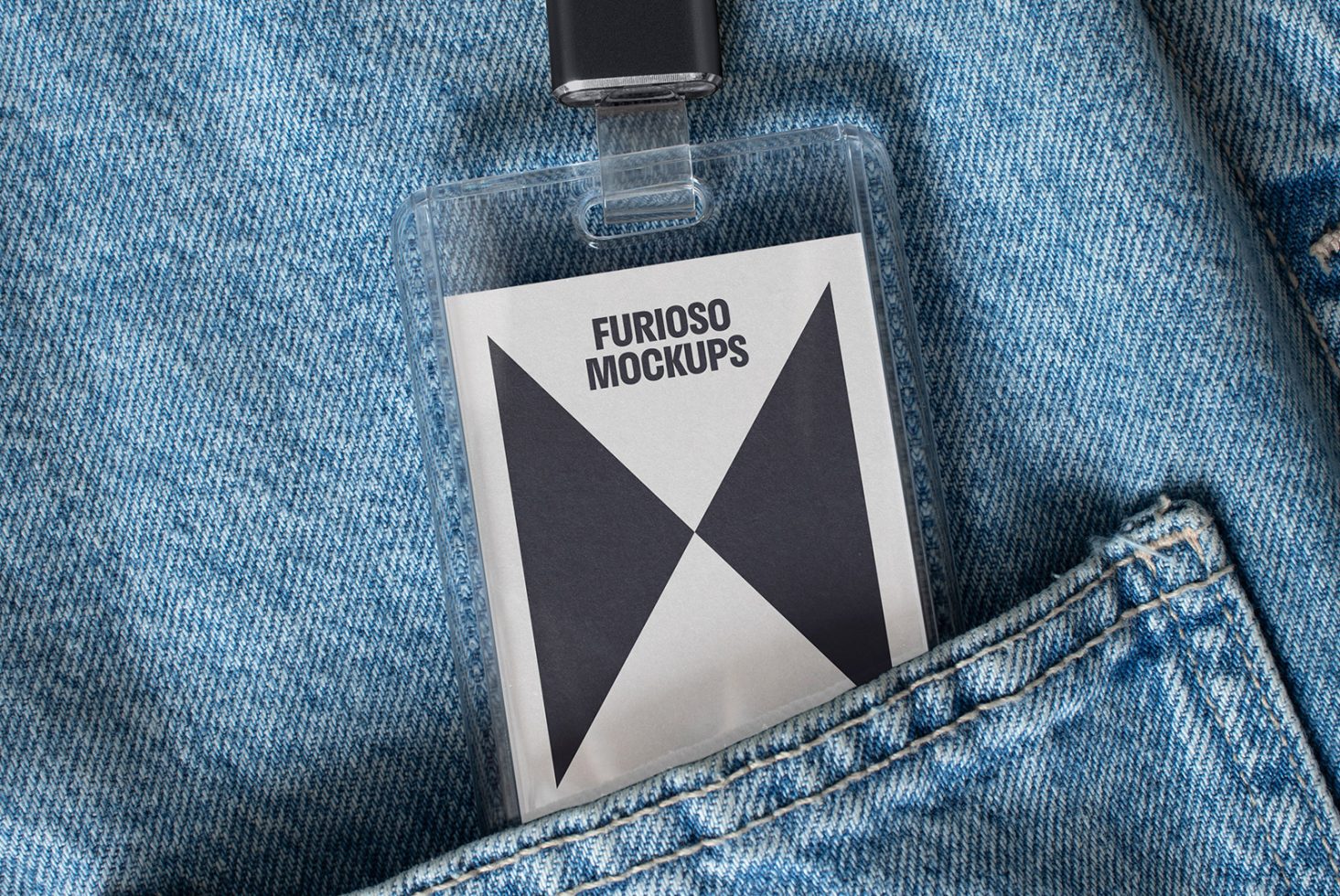 ID card mockup in a transparent holder labeled Furioso Mockups placed in a denim jacket pocket. Ideal for designers needing realistic ID templates.