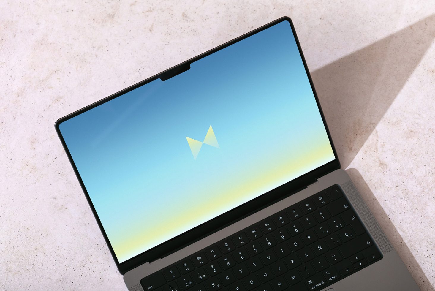 Laptop Mockup: Modern laptop with gradient blue screen and minimalist design, perfect for showcasing digital designs. Keywords: Mockups, Designers, Templates.