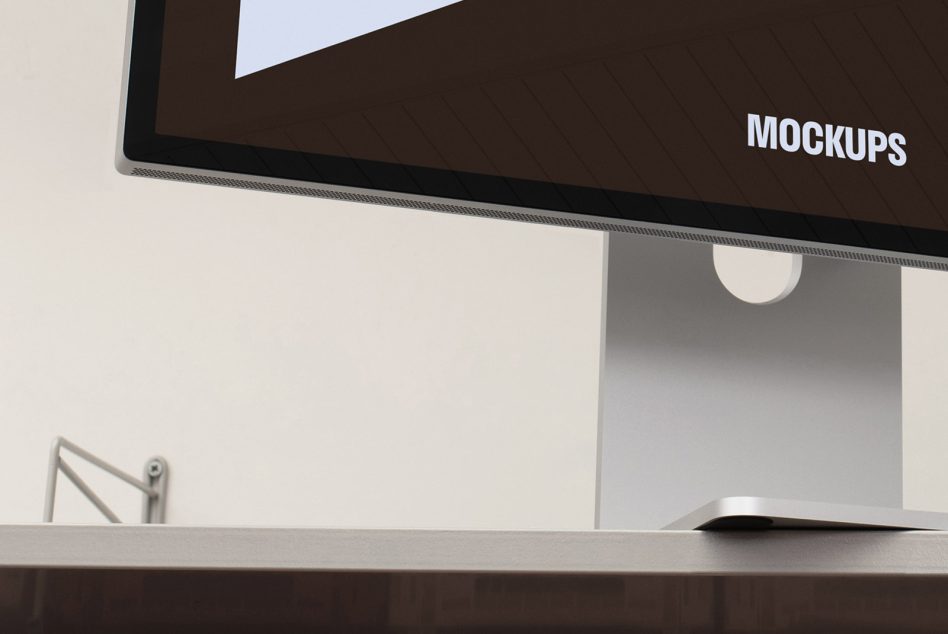 Close-up of a sleek modern computer monitor with the word Mockups displayed on screen ideal for showcasing digital mockup designs for designers SEO.