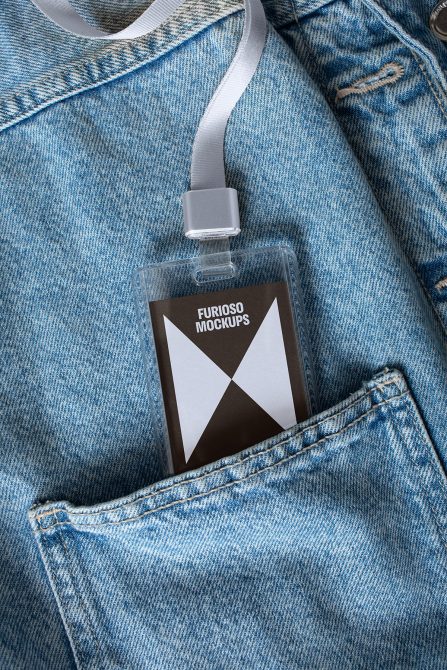 ID card mockup template tucked into blue denim pocket perfect for designers showcasing branding and name tag designs ideal for customizable mockup presentations