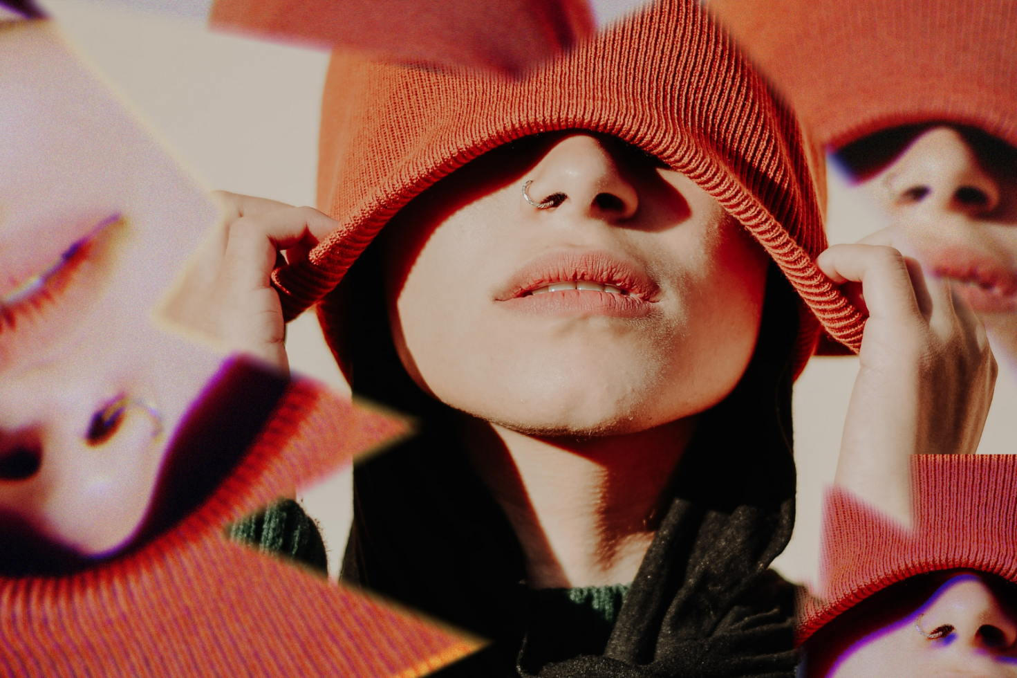 Surreal digital artwork of a person with a beanie covering their eyes with layered abstract edits. Perfect for design elements, creative templates, visual graphics.