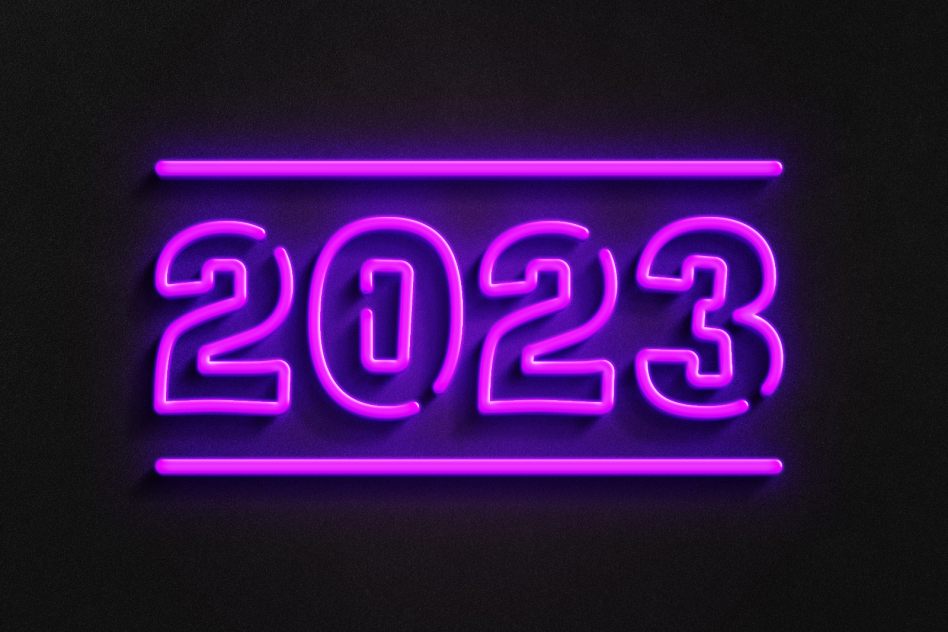 Neon 2023 sign in purple glowing font on black background ideal for designers seeking modern typography mockups templates digital art or graphic design assets