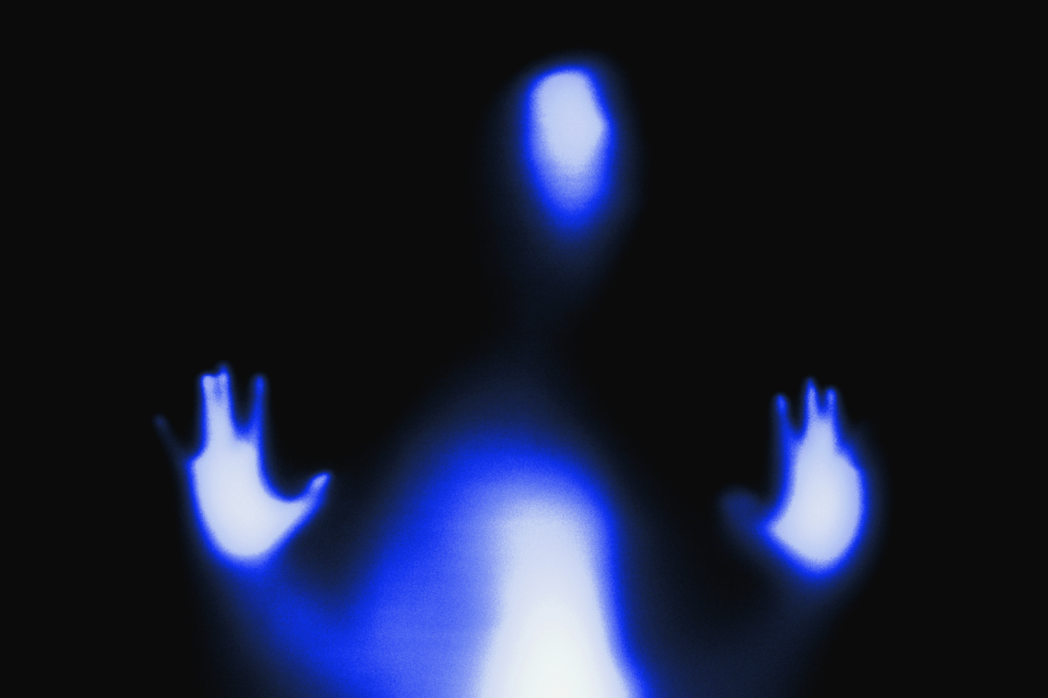 Blue glowing silhouette of humanoid figure with raised hands on dark background perfect for digital graphics designers eerie mysterious abstract design asset