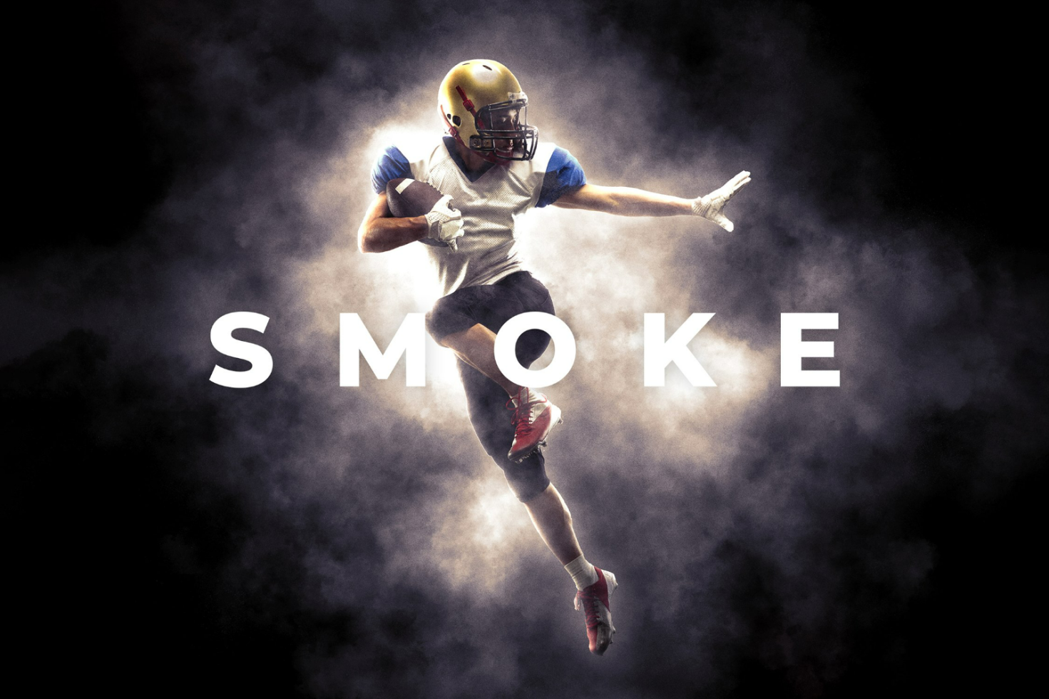 Football player in action with dark smoky background. Perfect for sports graphics, templates, mockups. Ideal for designers in need of dramatic visuals.