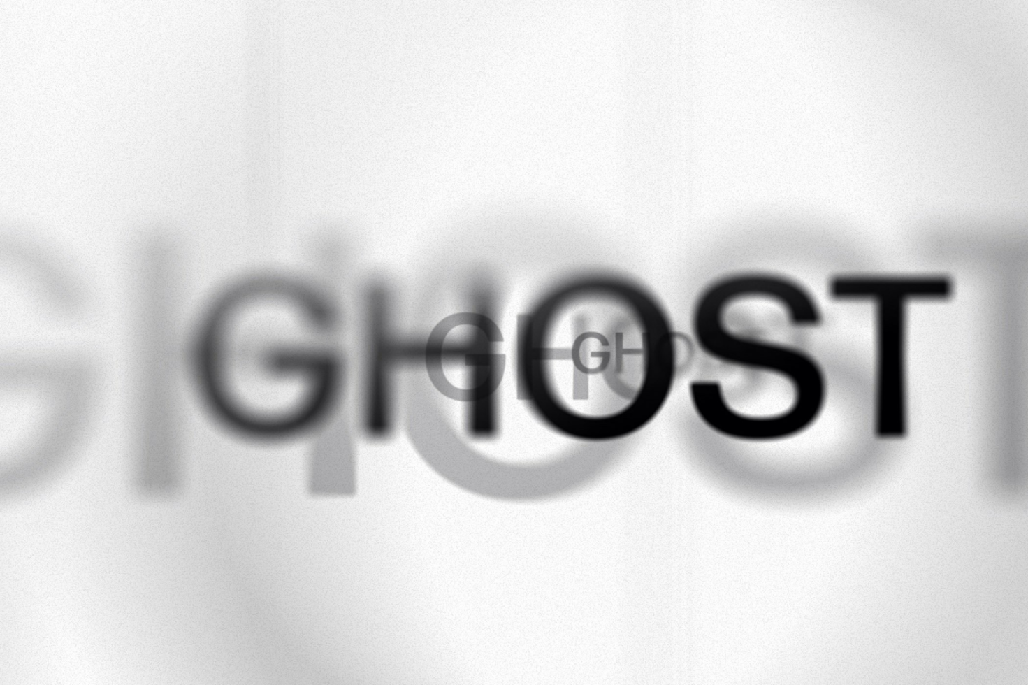 Typography design displaying the word ghost with blurred overlapping letters. Suitable for designers seeking abstract text effects. Keywords: typography, fonts, graphics.