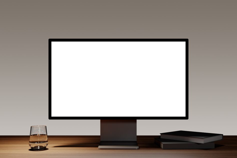 Desktop computer screen mockup on wooden table with glass of water and books. Blank monitor for designers, presentations, and UI templates. High-resolution graphics