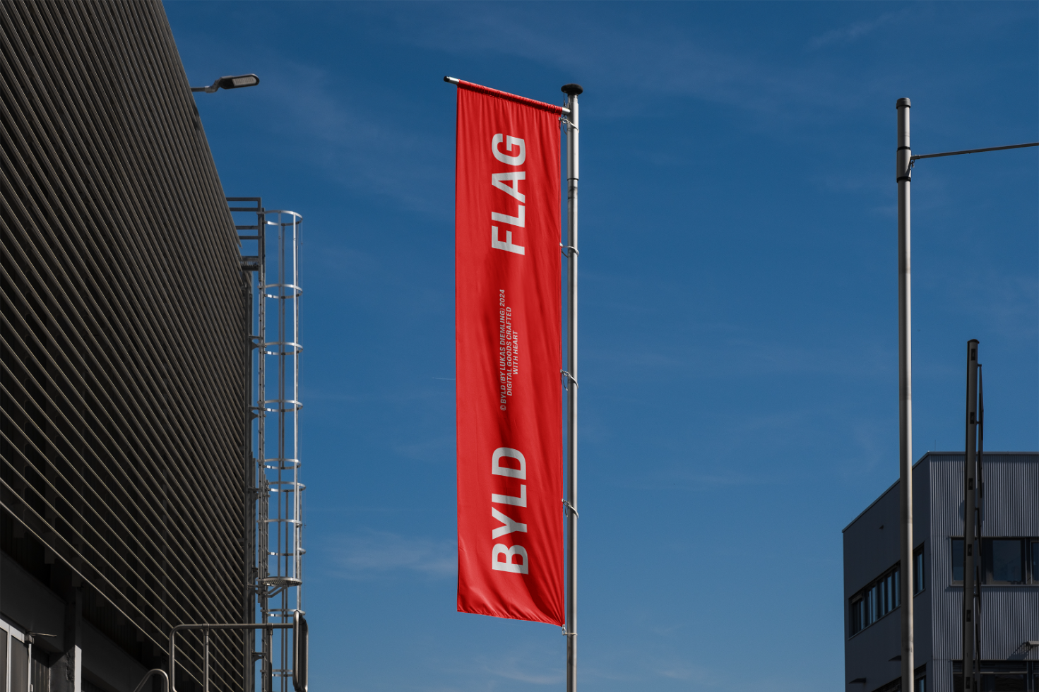 Commercial outdoor flag mockup against clear blue sky perfect for branding or advertising; download high-quality templates for designers from our digital assets platform