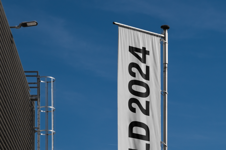 Vertical banner mockup displaying the text LD 2024 in bold black. Ideal for designers. Mockups category with keywords: mockup, banner, design, template.