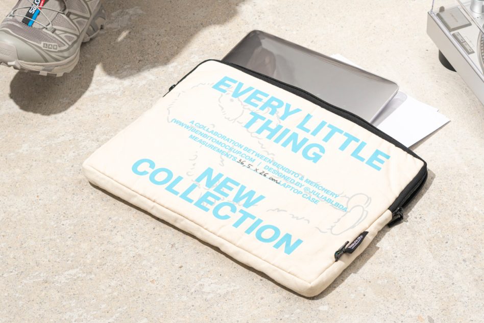 Cream neoprene sleeve mockup with blue text layout on pavement