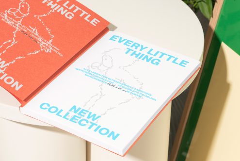 Two minimalist booklets on a table, featuring bold typography and simple illustrations. Ideal for designers looking for templates, mockups, or graphic assets.