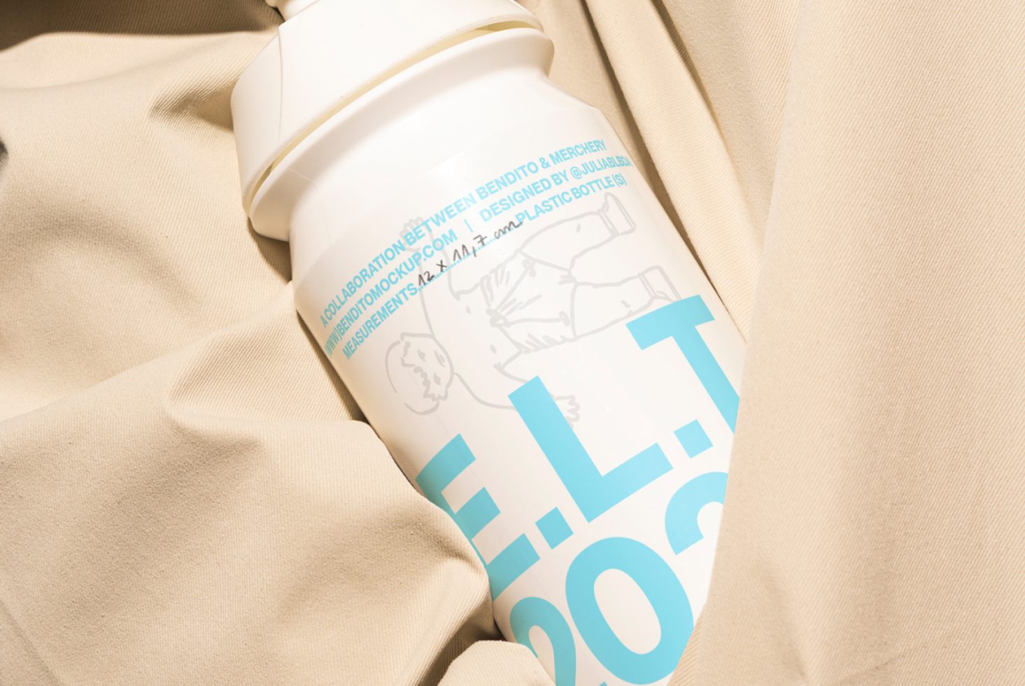 Close-up shot of a white plastic bottle with blue text leaning against beige fabric suitable for mockups. Ideal for designers seeking realistic product display templates.