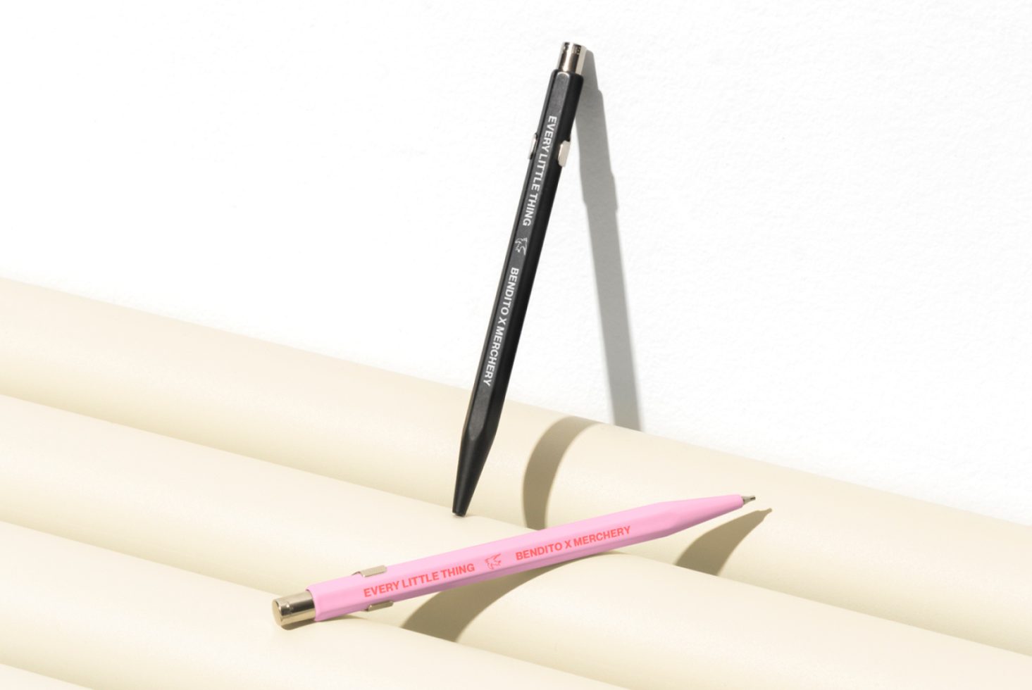 Black and pink pens mockup for designers with text Every Little Thing Bendito X Merchery perfect for promotional designs branding templates and graphic projects.