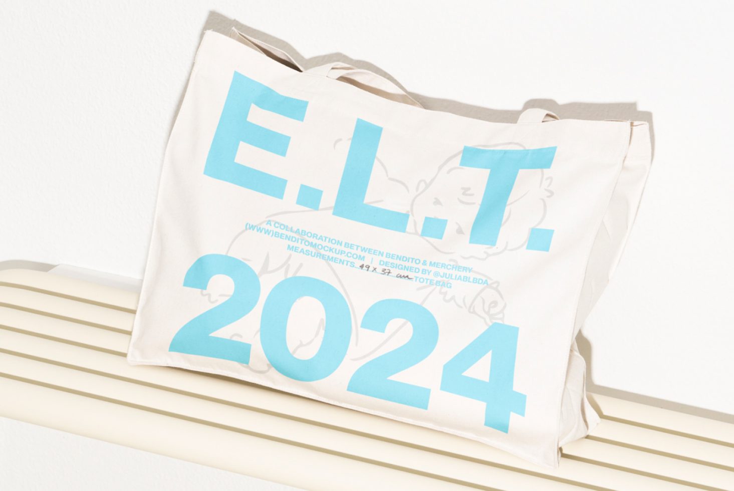 Canvas tote bag mockup with blue text and 2024 graphics perfect for designers showcasing tote bag designs digital assets typography templates SEO keywords.