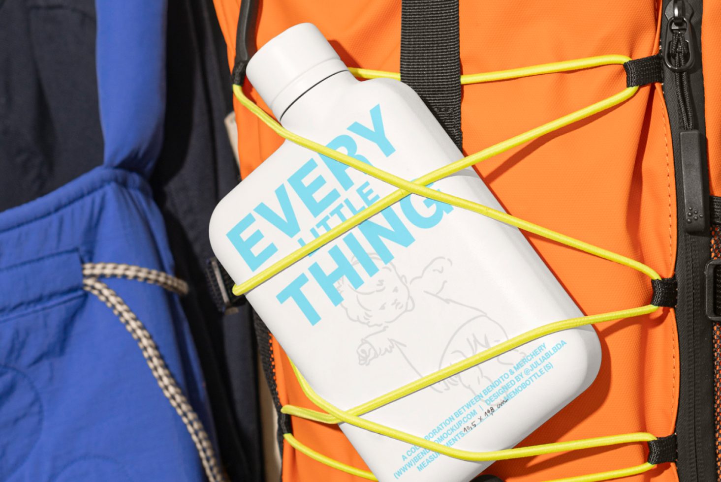 Close-up of water bottle strapped to a backpack with yellow bungee cords, labeled Every Little Thing, ideal for product mockups and graphic design templates.