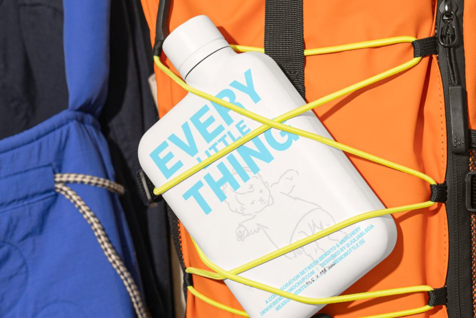 White water bottle with blue text strapped to bright orange backpack