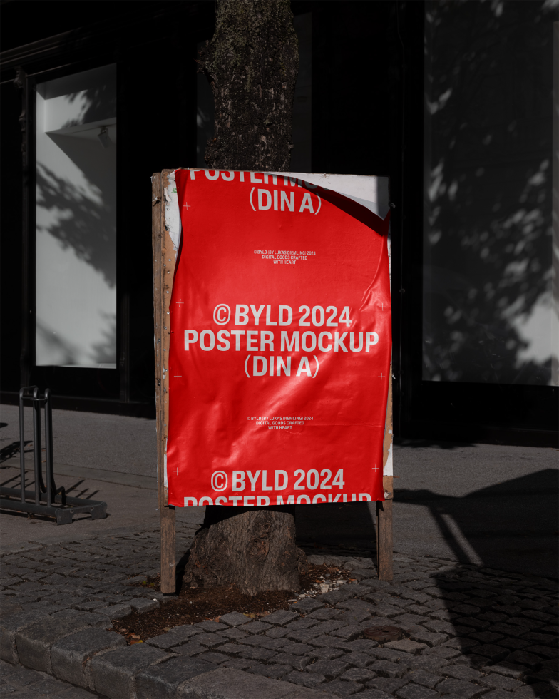 Outdoor poster mockup DIN A on tree trunk red design city street BYLD 2024 perfect for mockups designers graphics templates product display marketing advertising