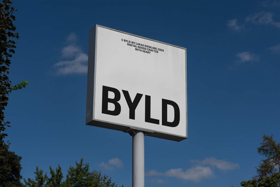 White outdoor signboard with black text BYLD against blue sky background. Suitable for designers. Categories: Mockups, Templates. Keywords: signage mockup outdoor template.