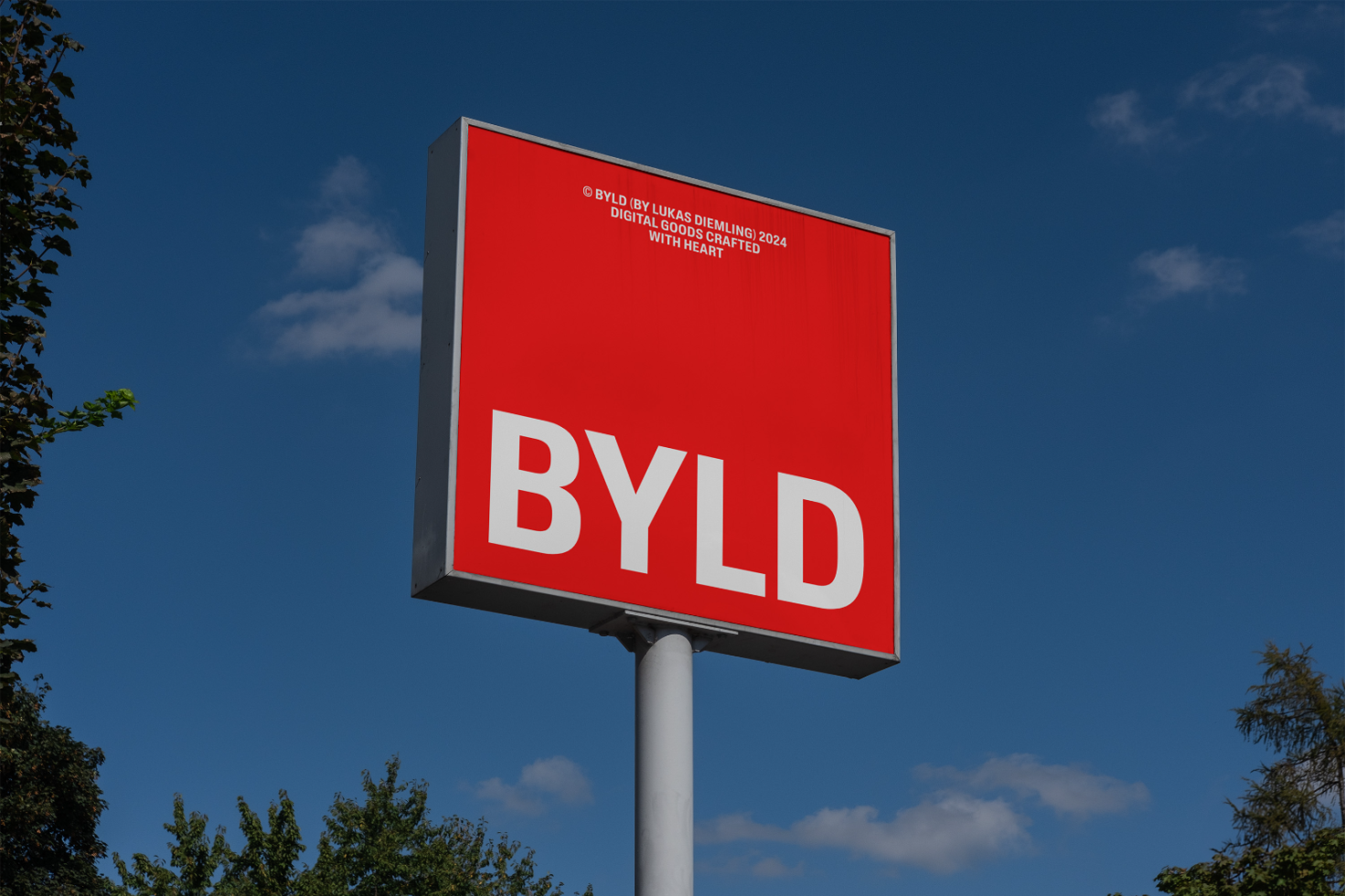 Mockup of a red billboard with the text BYLD in white letters on a pole against a blue sky, ideal for designers, templates, outdoor advertising visual.