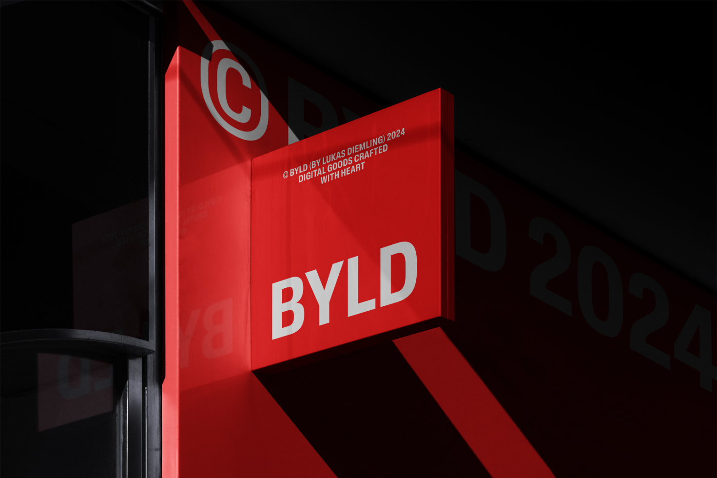 Red and black modern typography sign reading BYLD. Mockup for branding and signage design. Ideal for designers looking for sleek, professional templates.